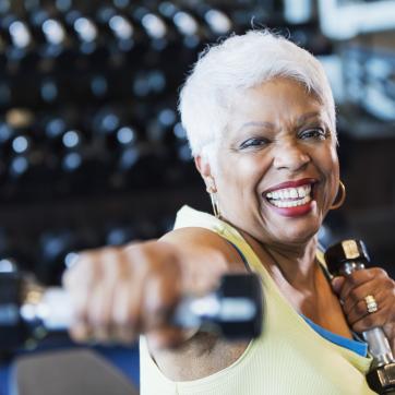 senior woman exercising with weights