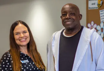 Fred and Lifestyle Coach Angela Rogers pose together for a photo, highlighting his journey in the YMCA’s Diabetes Prevention Program.