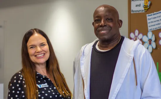 Fred and Lifestyle Coach Angela Rogers pose together for a photo, highlighting his journey in the YMCA’s Diabetes Prevention Program.