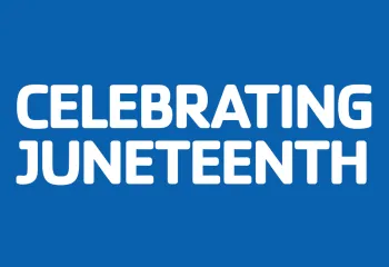 White text on a dark blue background. The text reads Celebrating Juneteenth.