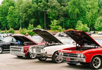 Cars lined up at a car show