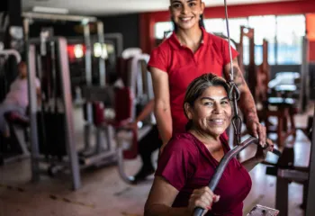 Woman and personal trainer