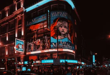 A photo of the musical Les Misérables on a theater display.
