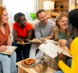 A diverse group of people attending a Bible study.