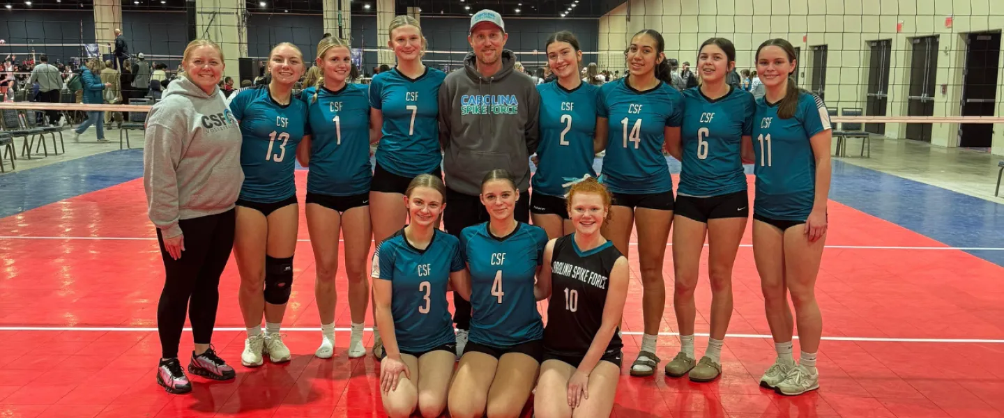 Carolina Spike Force volleyball athletes group photo with coaches