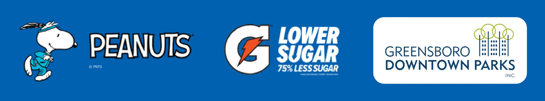 An illustration of Snoopy and then the Peanuts logo on the left side of a dark blue background. On the right side of the blue background is Gatorade's white G and orange lightning bolt logo and the words Lower Sugar, 75% Less Sugar. To the right is the logo for Greensboro Downtown Parks Inc. It features a line illustration of a row of buildings, which share lines with trees with circular green treetops.