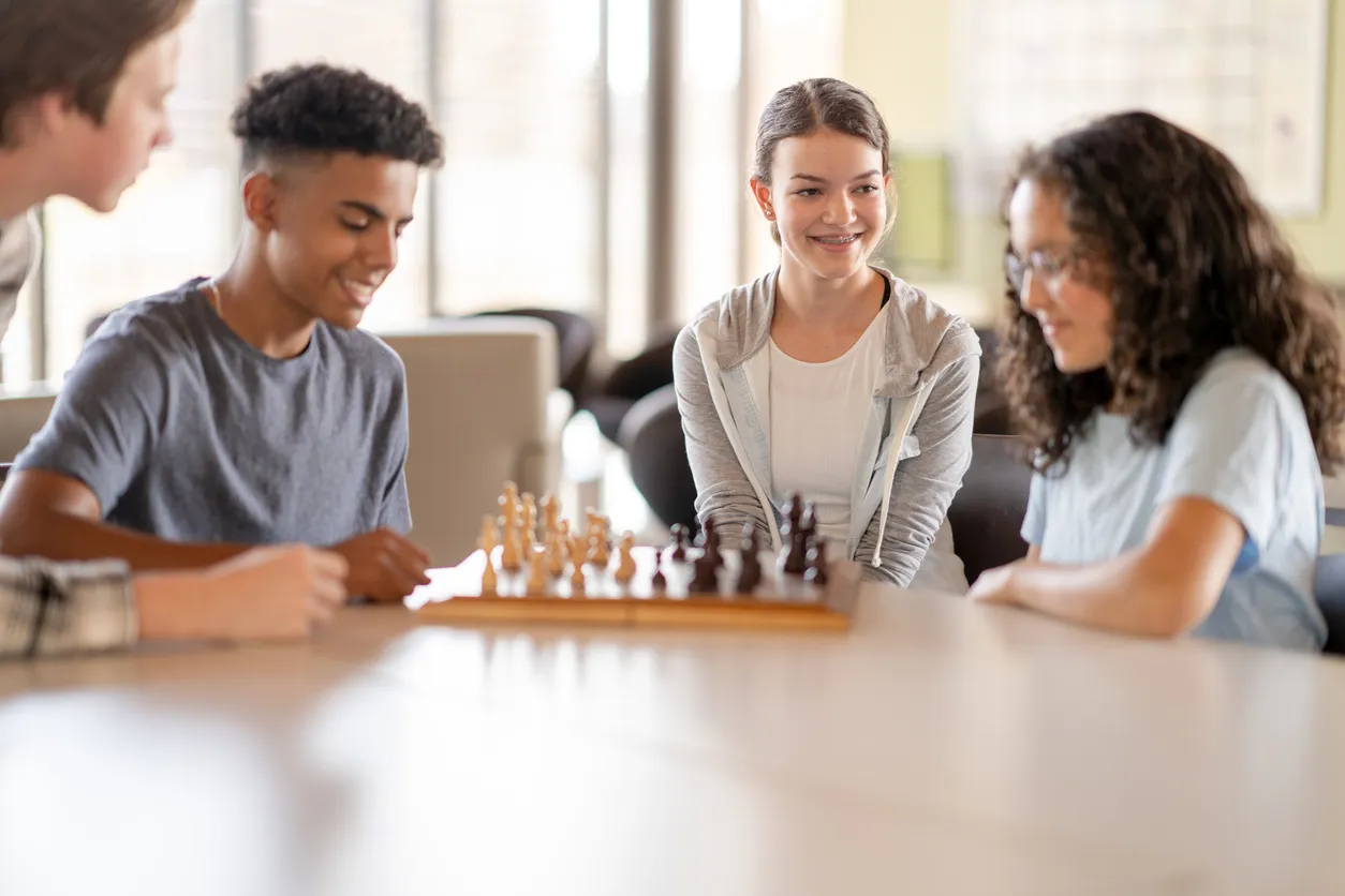 Teens playing chess