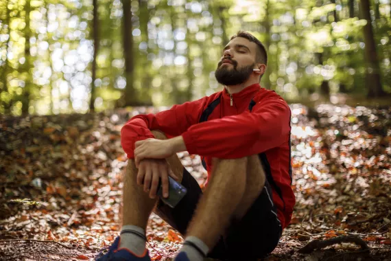 Man sitting on the forest