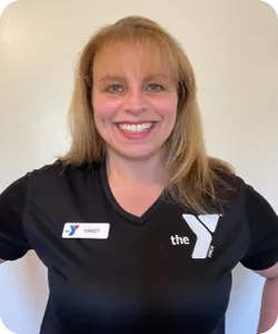 A portrait of Sandy Land, personal trainer at the Spears Y.