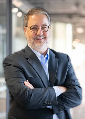 A portrait of Dennis Toman of the Elderlaw Firm.