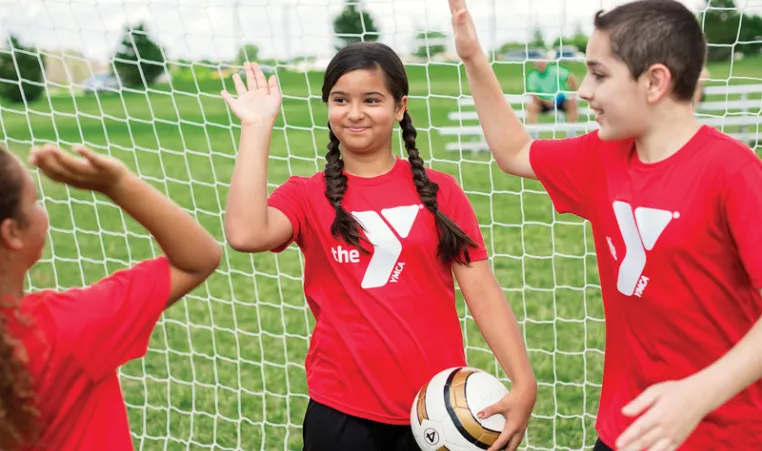 children playing soccer