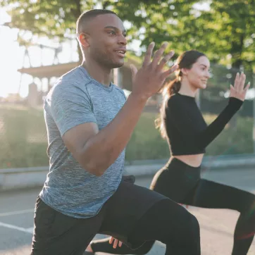 Couple working out outdoors