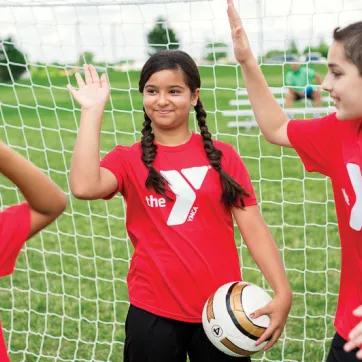 children playing soccer 