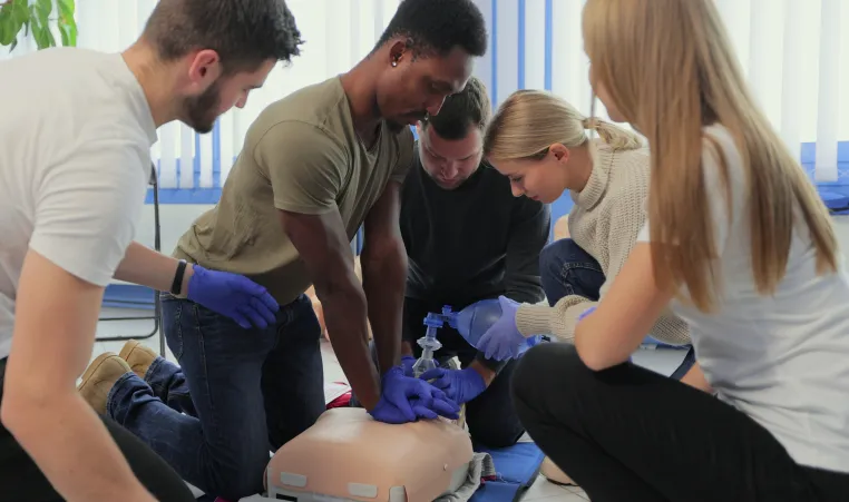 A diverse group of students at a CPR class.