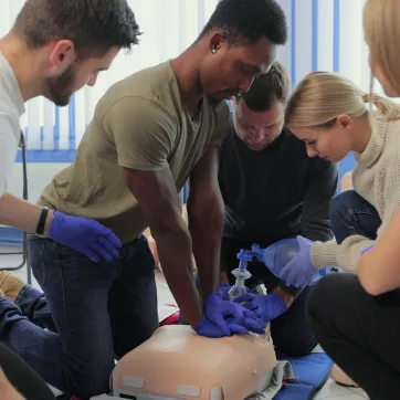 A diverse group of students at a CPR class.