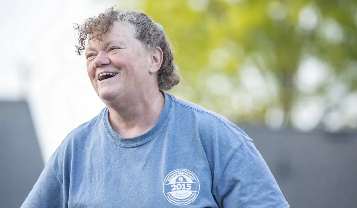 A woman smiles during an exercise class at the Reidsville YMCA.