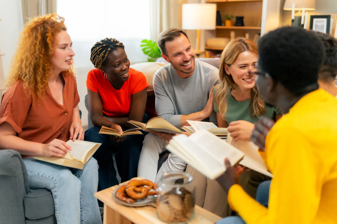 A group of people sitting together in a Bible study group.