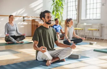 A yoga class with diverse participants.