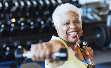 senior woman exercising with weights