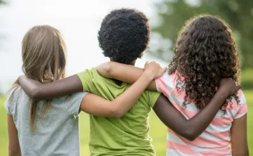 kids with arms around each other