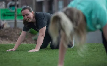 Woman doing Yoga in park with Y in the Community at YMCA of Greensboro