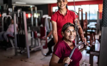 Woman and personal trainer