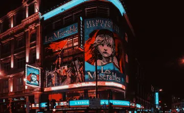 A photo of the musical Les Misérables on a theater display.