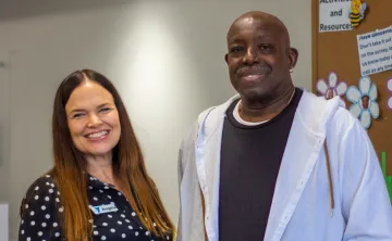 Fred and Lifestyle Coach Angela Rogers pose together for a photo, highlighting his journey in the YMCA’s Diabetes Prevention Program.