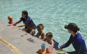 youth swimming in pool