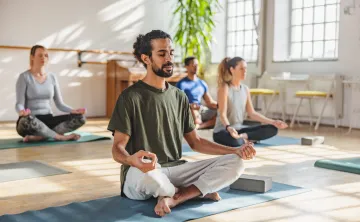 A yoga class with diverse participants.