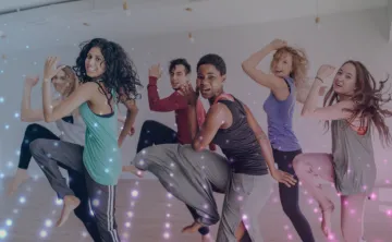Group of six participating in an upbeat zumba class
