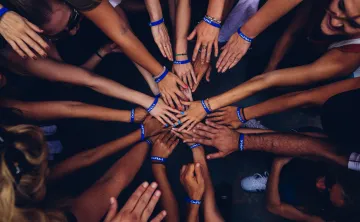 Many hands all together.